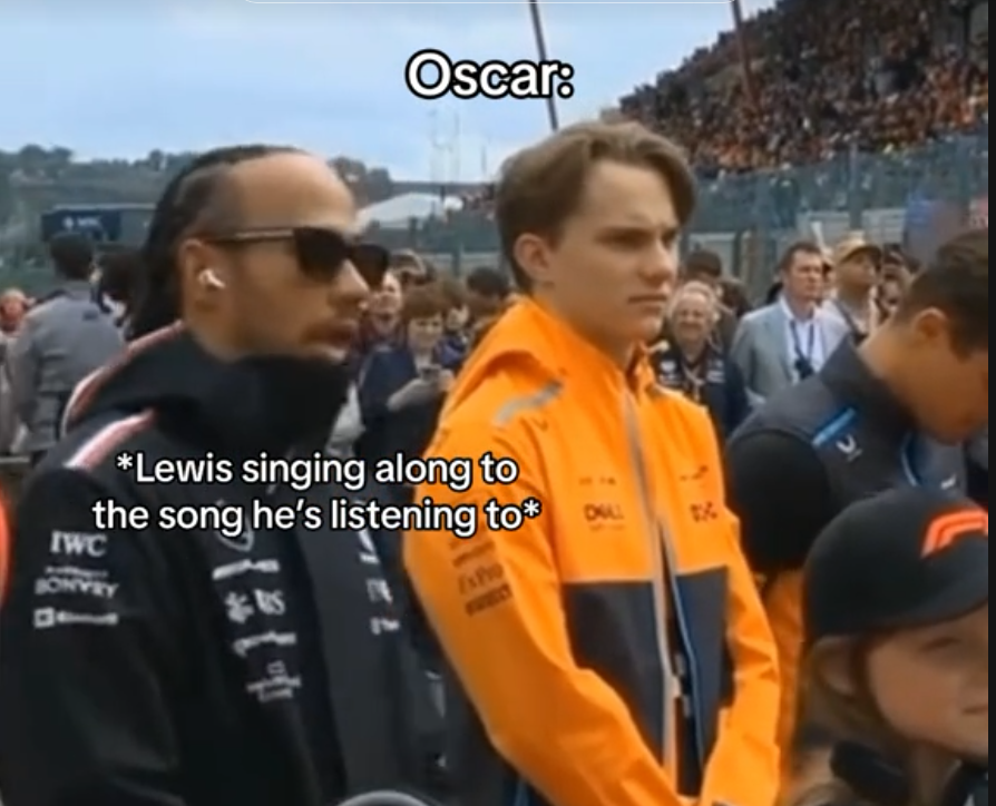 Lewis Hamilton during the national anthem vibing to his music